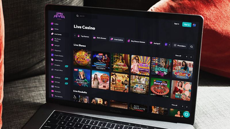 SpinFever Casino Live Games page on laptop